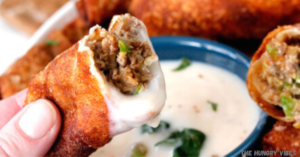 Philly Cheesesteak Egg Rolls with cheese sauce